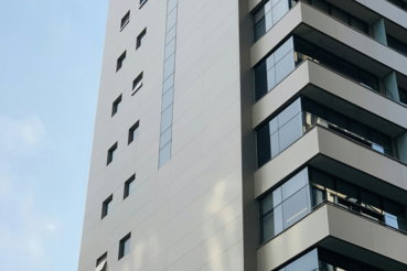 white concrete building under blue sky during daytime
